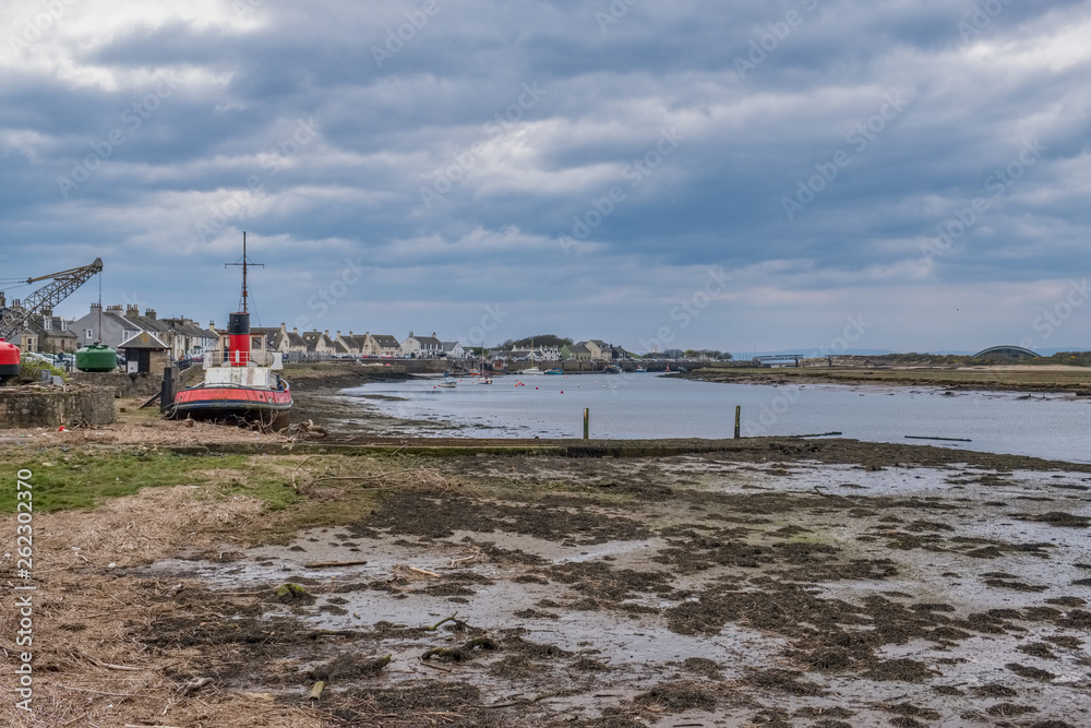 Irvine Harbour in Ayrshire Scotland looking up to the Old Science Museum Bridge at Low Tide. Irvine Harbour in Ayrshire Scotland looking up to the Old Science Museum Bridge at Low Tide.