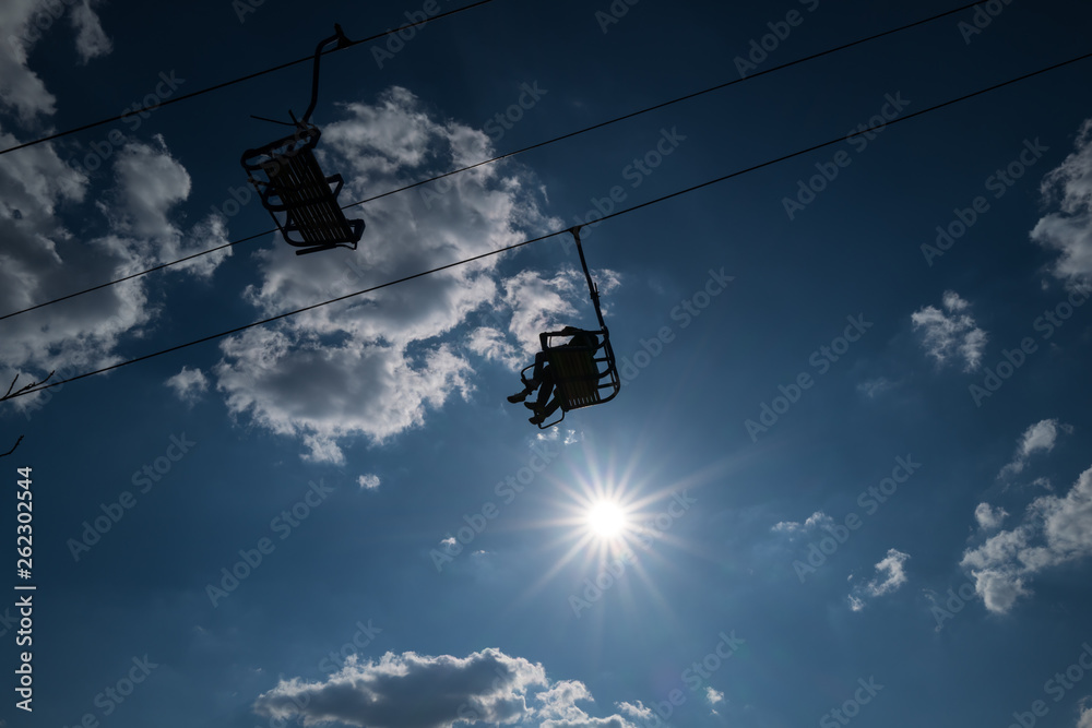 Cablecars with people against sunlight in Boppard Cablecars with people against sunlight in Boppard