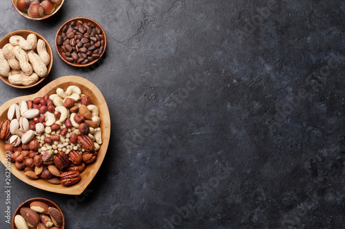 Various nuts selection on stone table