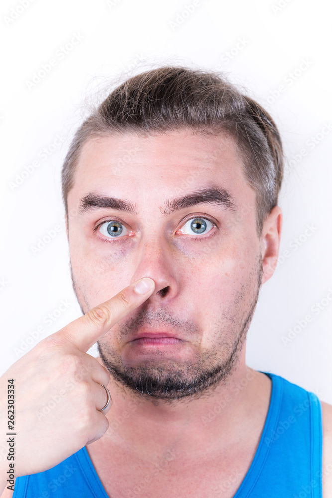 Obraz premium Emotional caucasian man showing gesture fingers