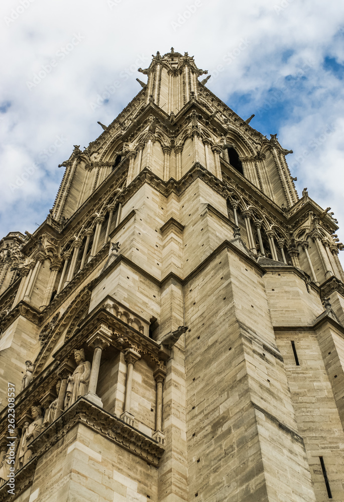 Architectural details of tower of Notre Dame de Paris. Notre Dame Cathedral - the most famous Gothic Roman Catholic Cathedral