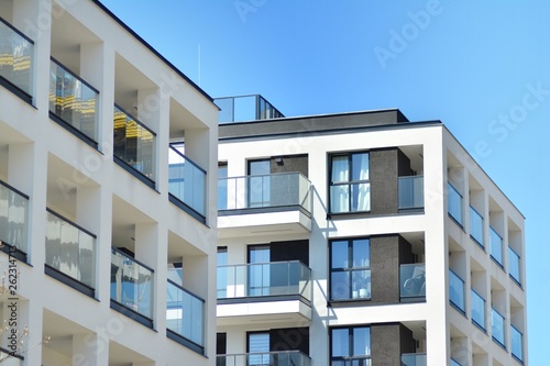 Modern apartment buildings on a sunny day with a blue sky. Facade of a modern apartment building