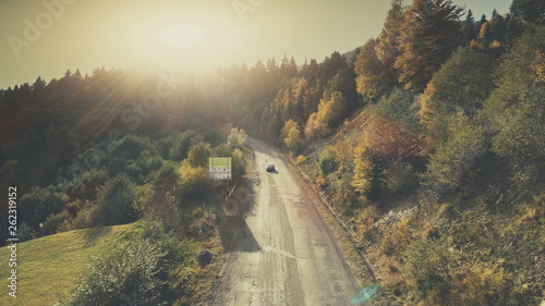 Mountain Hill Country Road Car Drive Aerial View. Roadside Automobile Highland Scenery Landscape Overview. Dense Green Forest Unpolluted Natural Environment Concept. Drone Flight
