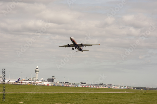 Airplane takes off at Schiphol Netherlands