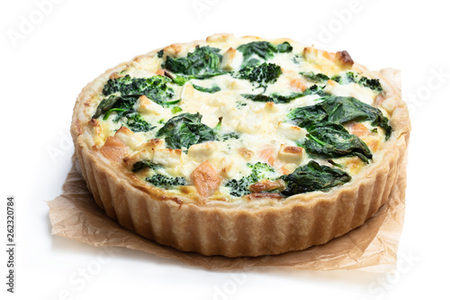 Raw salmon quiche wich broccoli and spinach isolated on white