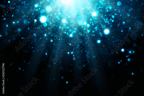 Abstract blue bokeh background.Glitter vintage lights background. © Swetlana Wall