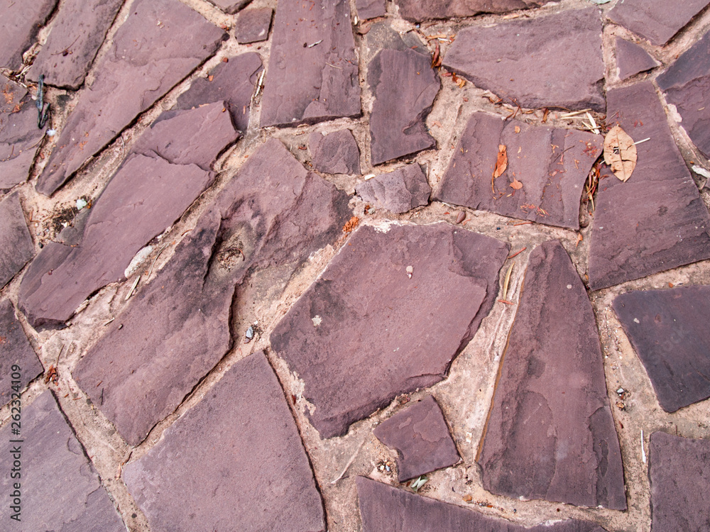 The texture of stone used for background images, Surface of stone brown color The texture of stone used for background images, Surface of stone brown color