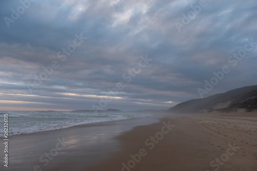 The sandy beach at Brenton on Sea, photographed at dusk. Knysna, South Africa.