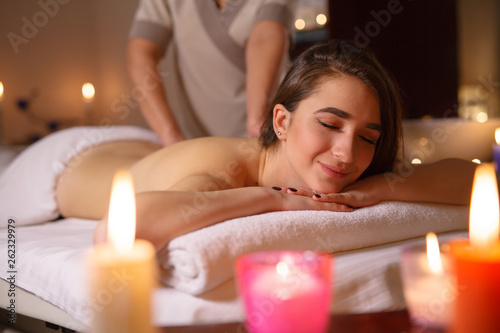 Girl on massage in the spa salon.