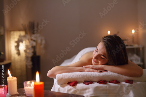 Girl on massage in the spa salon.