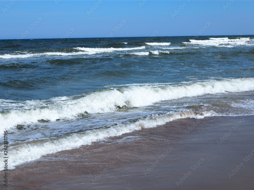 Waves breaking on beach