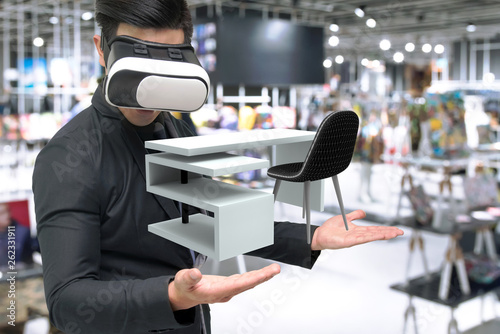 Vitual reality marketing technology for access entire product inventory in-store concept. Man suit use VR wearable device application for simulate furniture and colour in retail store. 3D rendering.