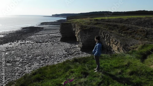 Beautiful 4k Beach Panorama Guy Standing On Top of Cliff