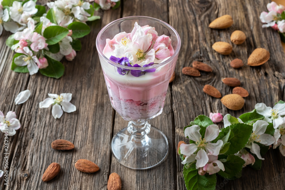 Chia pudding with almond milk and apple blossoms Chia pudding with almond milk and apple blossoms