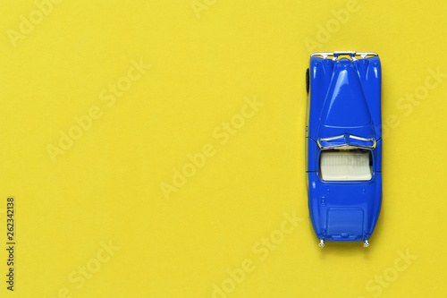 Photos Toy car on yellow background top view