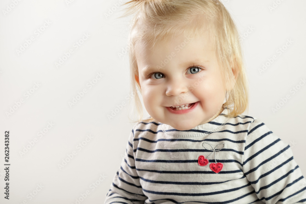 Studio portrait of adorable blonde smiling baby girl Studio portrait of adorable blonde smiling baby girl