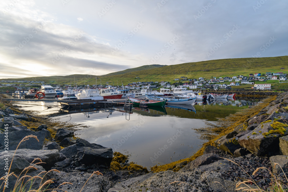 Reflections at a small village port, Midvagur Faroe Islands