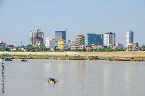 View from the Preah Sisowath Quay over the Tonle Sap River at the newly erected district in Phnom Penh photo