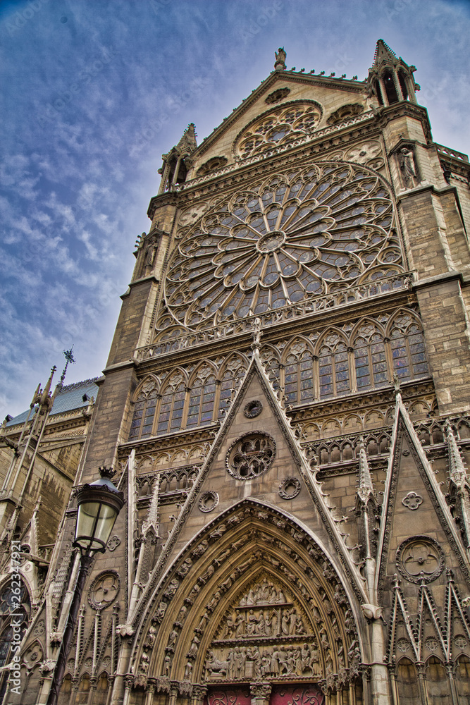 Fototapeta premium Side view with Rose window at Notre Dame of Paris