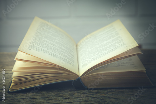 book on wooden background