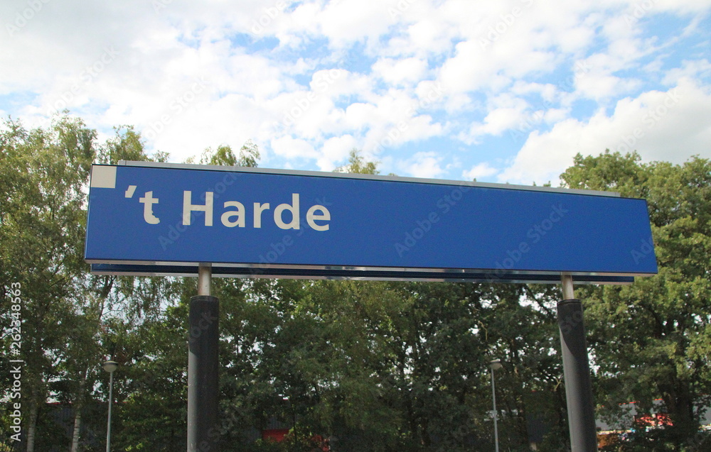 Fototapeta premium Name sign at the train station 't Harde close to Zwolle in the Netherlands