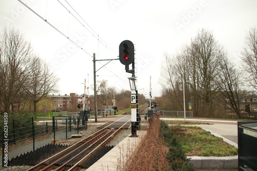 Red light sign at station Boskoop Snijdelwijk for R-NET train heading Gouda photo