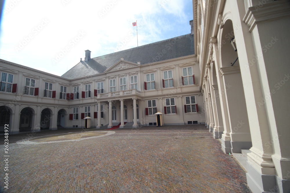 Front of the working palace Noordeinde of king Willem Alexander in Den Haag (The Hague) in the Netherlands with crest