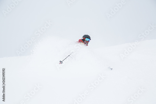 Face shots in the powder of Hokkaido, Japan. Backcountry skiing near Niseko Mountain.