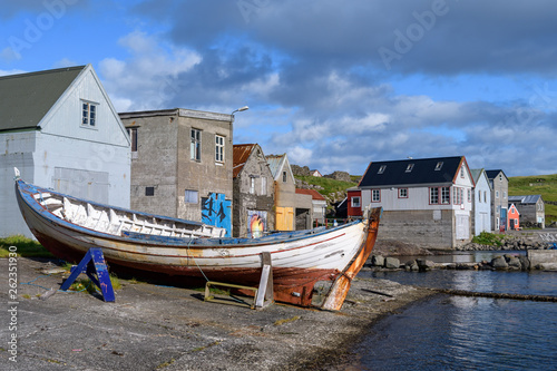 Fishing boats in Nolsoy village, Faroe Islands photo
