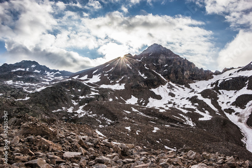 high mountains covered with snow and ice, peaks and valleys in the Caucasus © yuliagubina