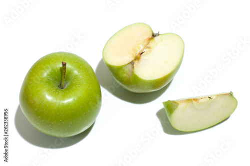 Ripe parts green apple Isolated on a white background. Healthy eating and dieting concept