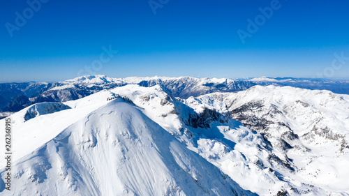 Aerial view of a mountains peak from a drone © Benjamin