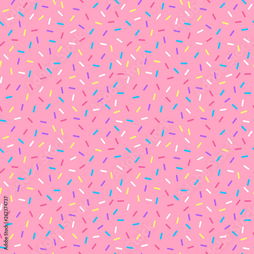 Sprinkles Seamless Pattern - Colorful sprinkles on solid background repeating pattern design photo