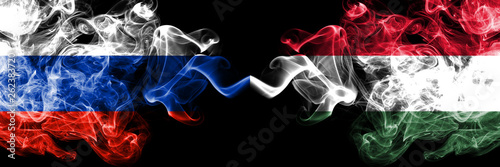 Canvas Print Russian vs Hungary, Hungarian smoke flags placed side by side