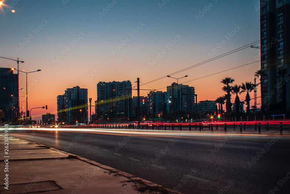 a long exposure cityscape shoot at sunset - orange color is dominant