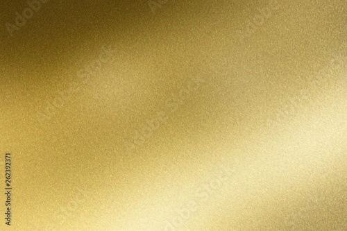 Abstract texture background, glowing golden stainless steel sheet