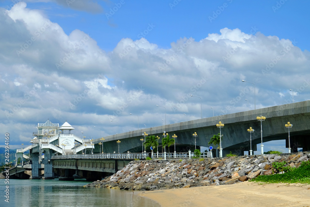 Sarasin bridge in Thailand, crossing Andaman sea between Phuket island and Phang Nga province, with the name of the bridge in Thai and English language on the fortress