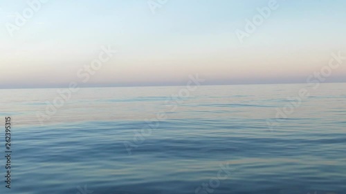 Wallpaper Mural a calm day on the ocean with no waves and blue sky Torontodigital.ca