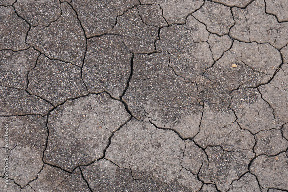 global warming and environment problem concept - crack on soil with no moisture and rain global warming and environment problem concept - crack on soil with no moisture and rain