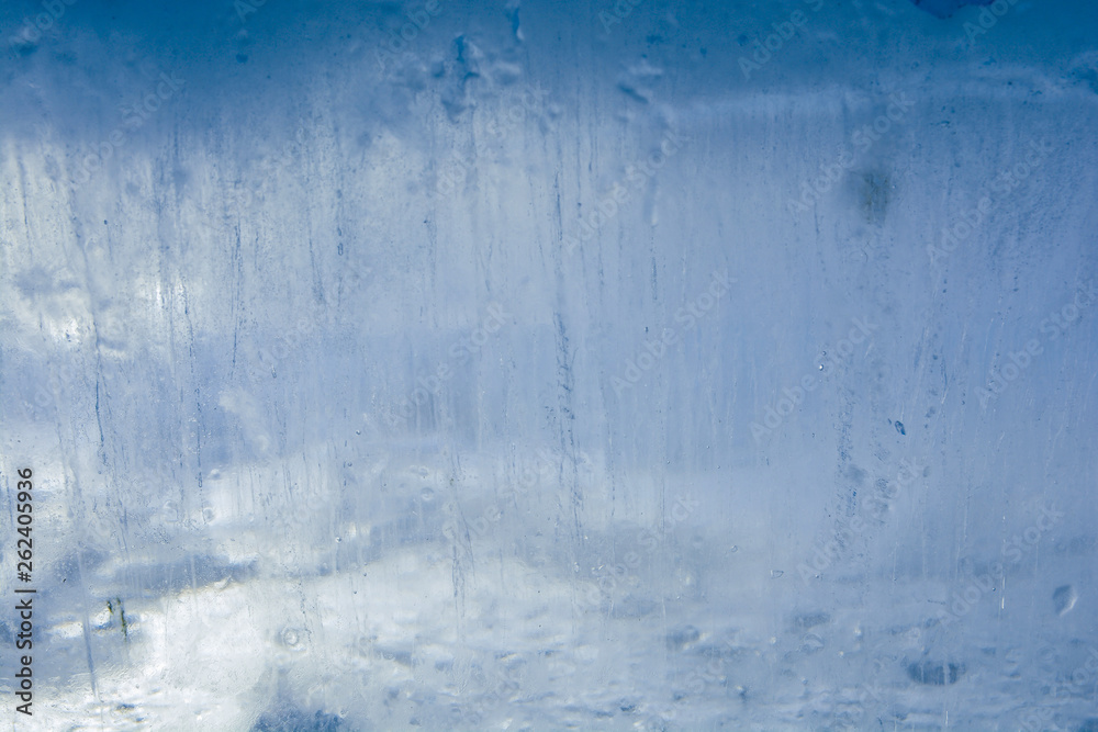 The texture of the ice. The frozen water.Winter background The texture of the ice. The frozen water.Winter background