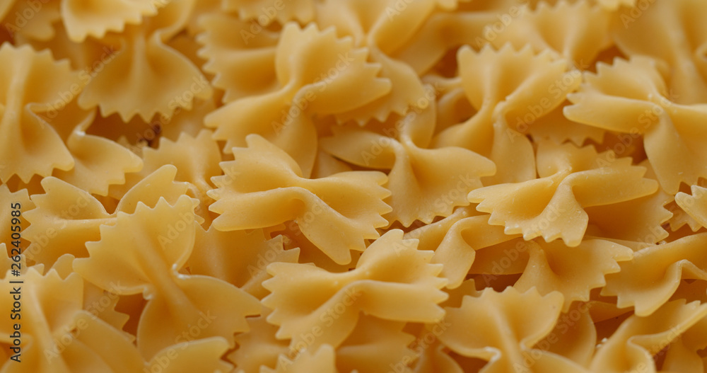 Stack of Dry uncooked farfalle