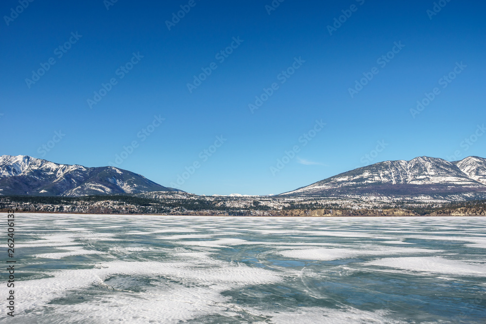 early spring landscape of frozen Columbia Lake Regional District of East Kootenay Canada. early spring landscape of frozen Columbia Lake Regional District of East Kootenay Canada.