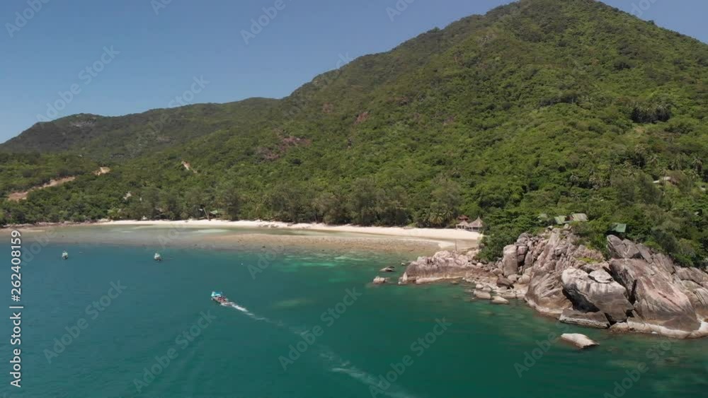 Panning shot of boat cruising along the waters in Ko Pha-ngan District Surat Thani Thailand Panning shot of boat cruising along the waters in Ko Pha-ngan District Surat Thani Thailand