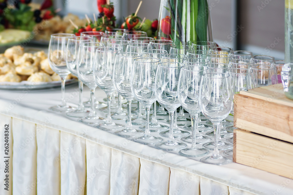 Empty wineglasses on a buffet table, food, tasty