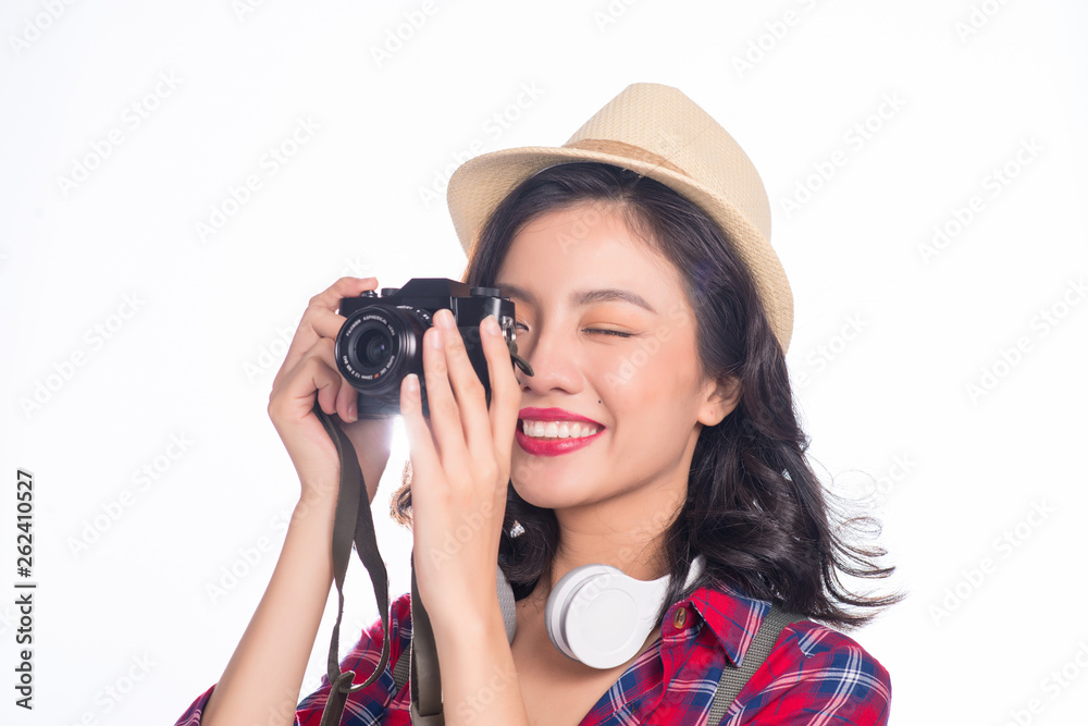 Woman travel. Young beautiful asian woman traveler taking pictures on white background Woman travel. Young beautiful asian woman traveler taking pictures on white background