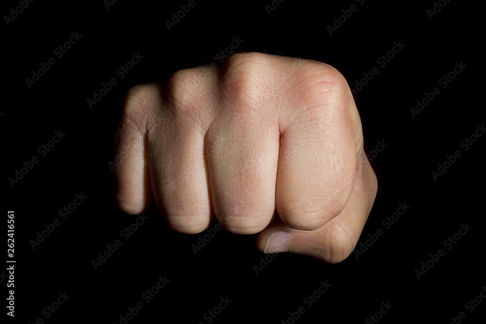 Hand clenched into a fist Hand clenched into a fist