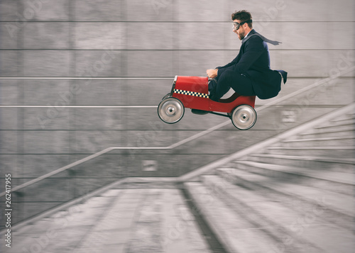 Reckless business man goes down the stairs with a car to get before the others. Concept of success and competition