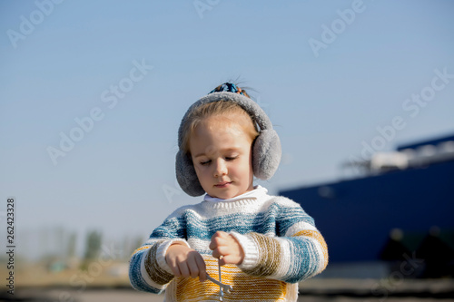 Little girl with a wrench