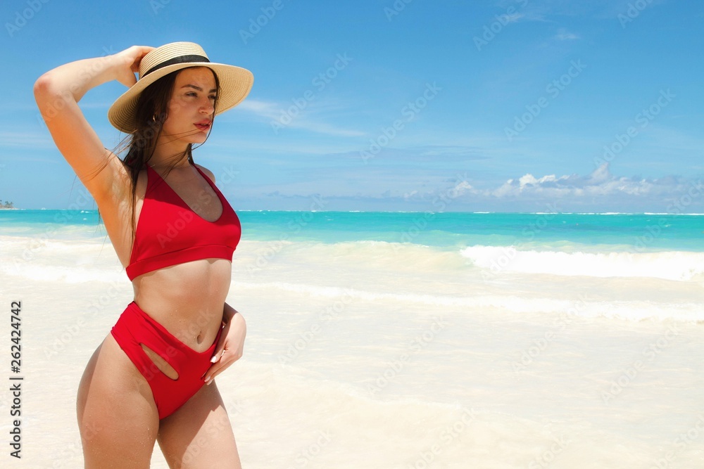 Girl on the beach. Summer holiday idyllic.