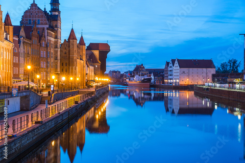 Gdansk at night with reflection in Motlawa river, Poland